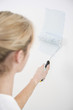 Foto: Woman painting wall Woman painting wall