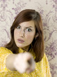 Woman pointing at camera