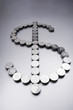 Coins making a dollar sign