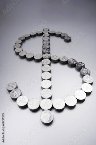 Photo: Coins making a dollar sign Coins making a dollar sign