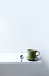 Coffee cup with teaspoon