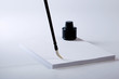 Foto: Paintbrush with paper and ink Paintbrush with paper and ink