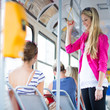 Pretty, young woman on a streetcar/tramway
