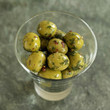 Glass of fresh Italian olives