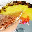Cocktail with pineapple and pink elephant