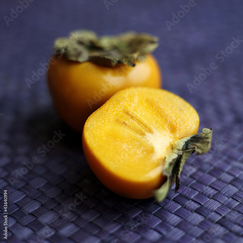 Photo: High angle close-up of persimmon High angle close-up of persimmon