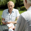 Senior couple playing cards