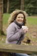 Woman holding a cup
