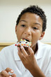 Boy eating cake