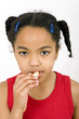 Photo: Girl eating orange Girl eating orange