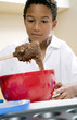 Boy learning baking