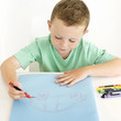 Photo: Boy drawing a car Boy drawing a car