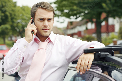 Photo: Businessman talking on the mobile phone Businessman talking on the mobile phone