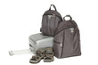 Silver travel suitcase, two gray backpacks and travel shoes