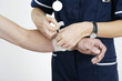 Female nurse treating a patient
