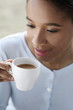 Woman enjoying a cup of coffee