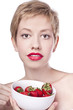 Young beautiful happy smiling woman with strawberry