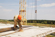 Worker at the building of a house