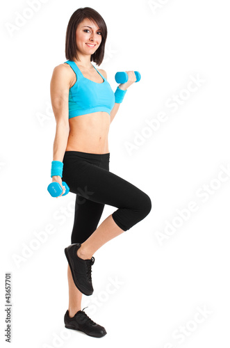 Foto: Woman working out isolated on white Woman working out isolated on white