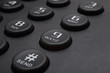 Buttons of black phone closeup