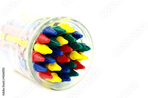 Foto: Colorful Wax Crayons In A Glass Jar Colorful Wax Crayons In A Glass Jar