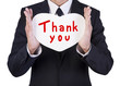 Businessman holding paper heart shape