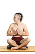 young man in meditation, portrait in studio