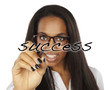 african succes business woman drawing a graph