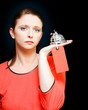 Woman holding service bell with tipping price tag
