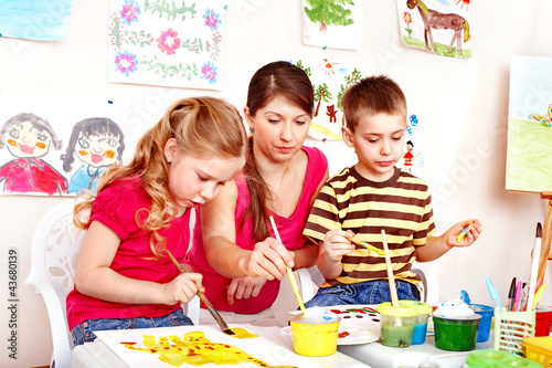 Photo: Child painting . Child painting .