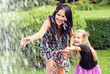 Foto: Happy mother and daughter in park Happy mother and daughter in park