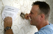 Photo: Young man fired from his job Young man fired from his job