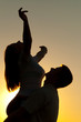 Silhouettes of young couple in love