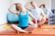 Couple exercising at gym