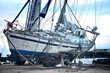 Hole in the hull of boat after the crash on the rocks