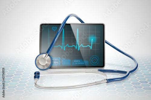 Photo: Medical tablet on futuristic background Medical tablet on futuristic background