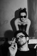 Young man and woman in sunglasses