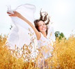Foto: Beautiful Happy Girl on the Wheat Field Beautiful Happy Girl on the Wheat Field
