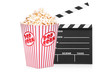 A studio shot of an open movie clap and popcorn box