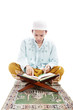 Photo: Muslim man reading quran Muslim man reading quran