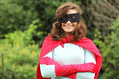 Photo: Smiling super hero girl Smiling super hero girl