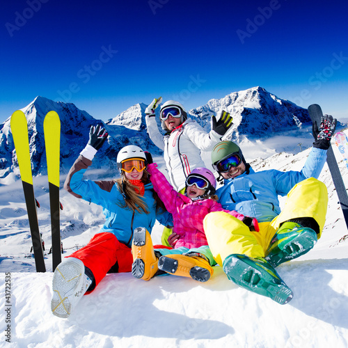 Photo: Skiing, winter fun - happy family ski team Skiing, winter fun - happy family ski team