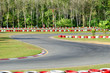 Turn on a empty race car circuit.