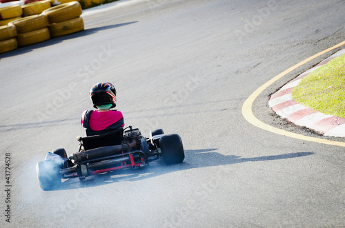 Photo: Driver on kart circuit Driver on kart circuit
