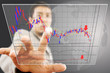 Businessman pushing finance graph for trade stock market.