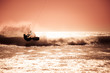 Kite surfing in waves.