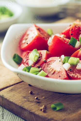 Photo: Tomato salad with spring onion and coriander seeds Tomato salad with spring onion and coriander seeds