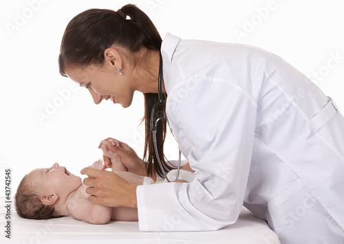 Photo: female doctor and a baby female doctor and a baby