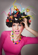 Portrait of a female isolated with lollipops in the hair