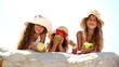 Little girls eating apples